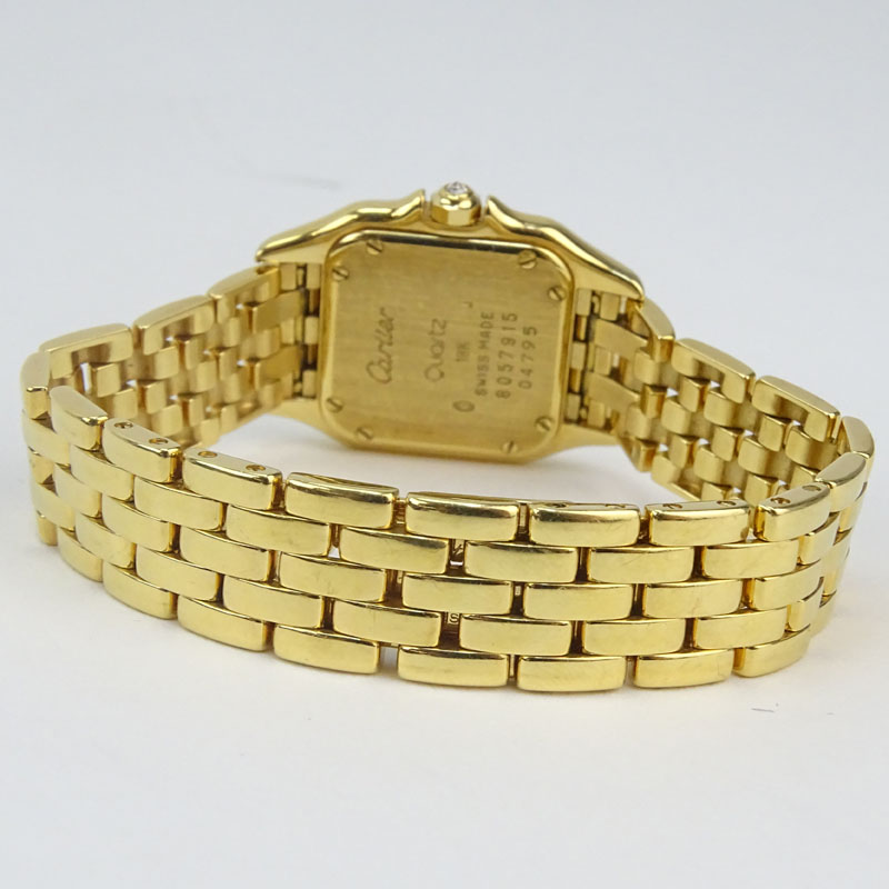 Lady's Cartier 18 Karat Yellow Gold and Diamond Panther Bracelet Watch with Swiss Quartz Movement, Box, Papers and Extra Bracelet Links. 