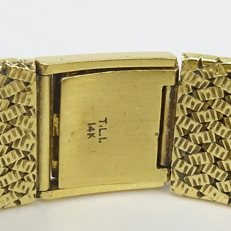 Man's Vintage Jules Jurgensen 14 Karat Yellow Gold Bracelet Watch with Manual Movement.