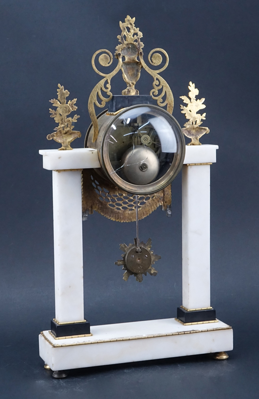 Antique French Marble And Gilt Bronze Clock. ''Babin a Corbeil'' on porcelain face.