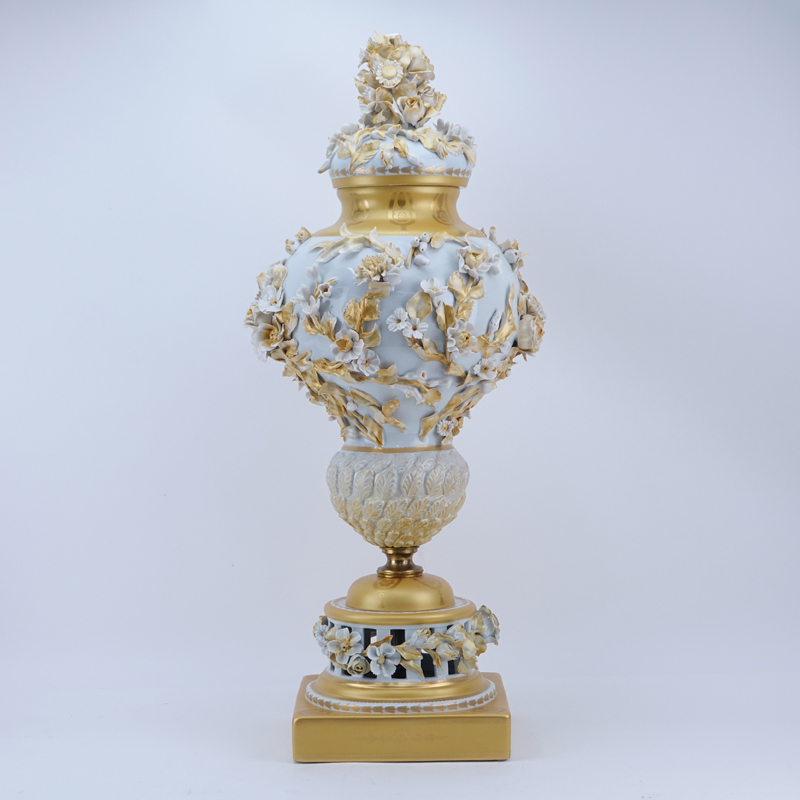Very Large Mangani Italian Porcelain Covered Urn With Applied Flowers. Reticulated base, gilt decoration and highlights. 