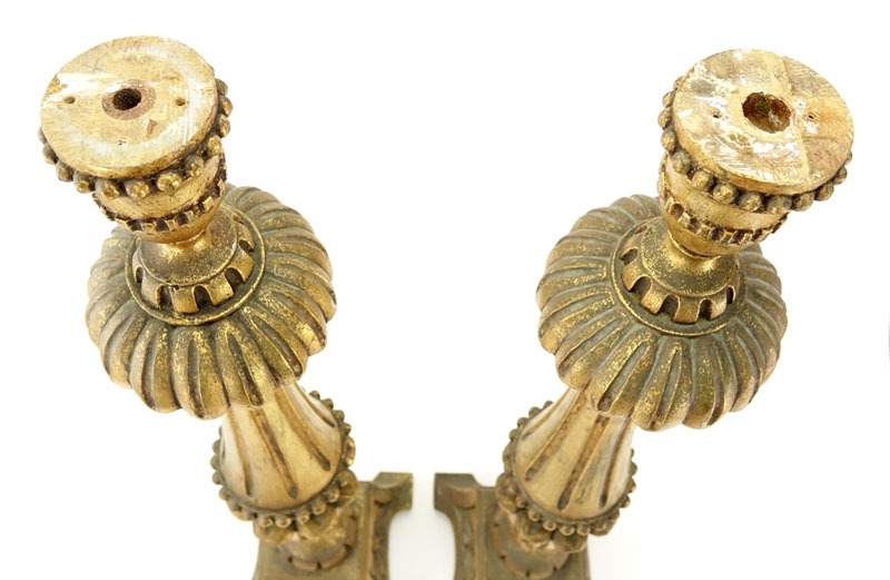 Pair of Tall Louis XVI Style Carved Gilt Wood Candlesticks.
