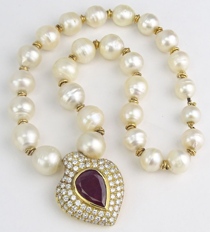 Vintage Large Pear Shape Burma Ruby, Approx. 8.0-8.5 Carat Round Brilliant Cut Diamond, Baroque Pearl and 18 Karat Yellow Gold Pendant Necklace. 