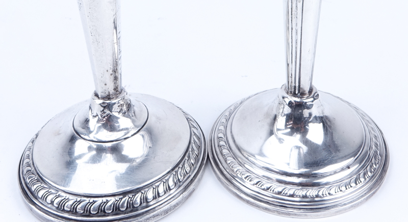 Two (2) Pair Weighted Sterling Silver Candlesticks.