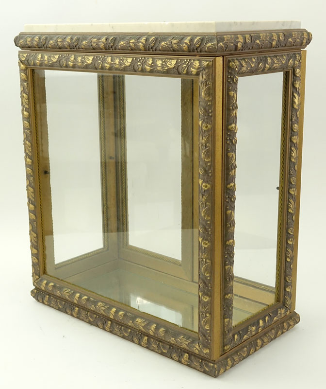 Small Vintage Curior Cabinet. Wood frame with glass and mirrored shelves.