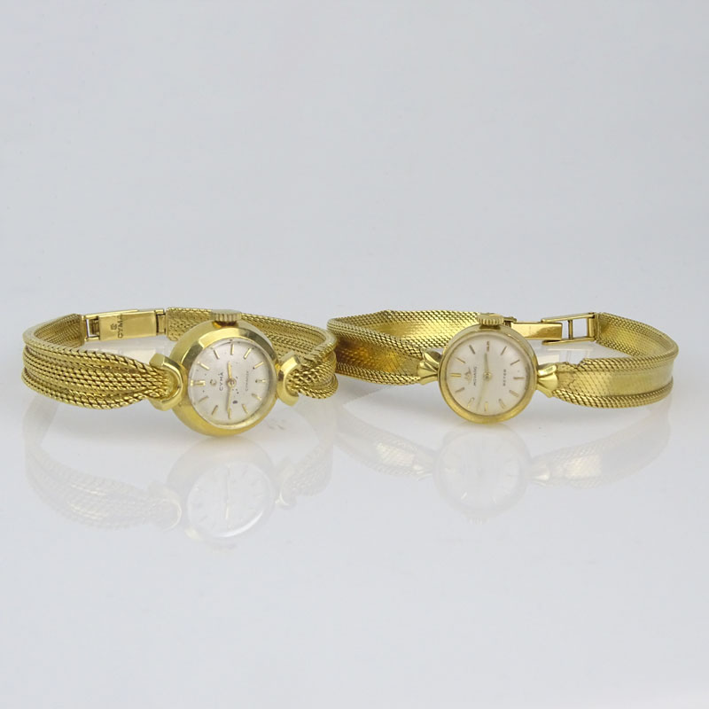 Lady's Vintage 18 Karat Yellow Gold Movado Bracelet Watch together with Vintage Cyma 18 Karat yellow Gold Bracelet watch.