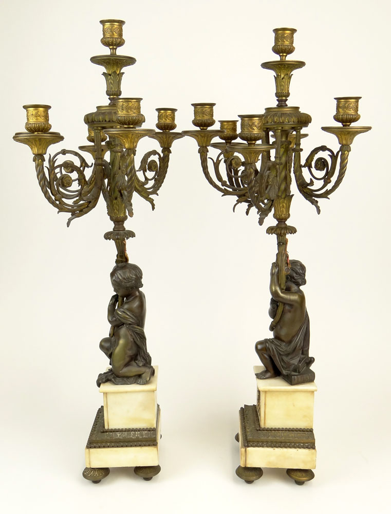 Pair of Antique French Bronze and Marble Figural Six Light Candelabra.