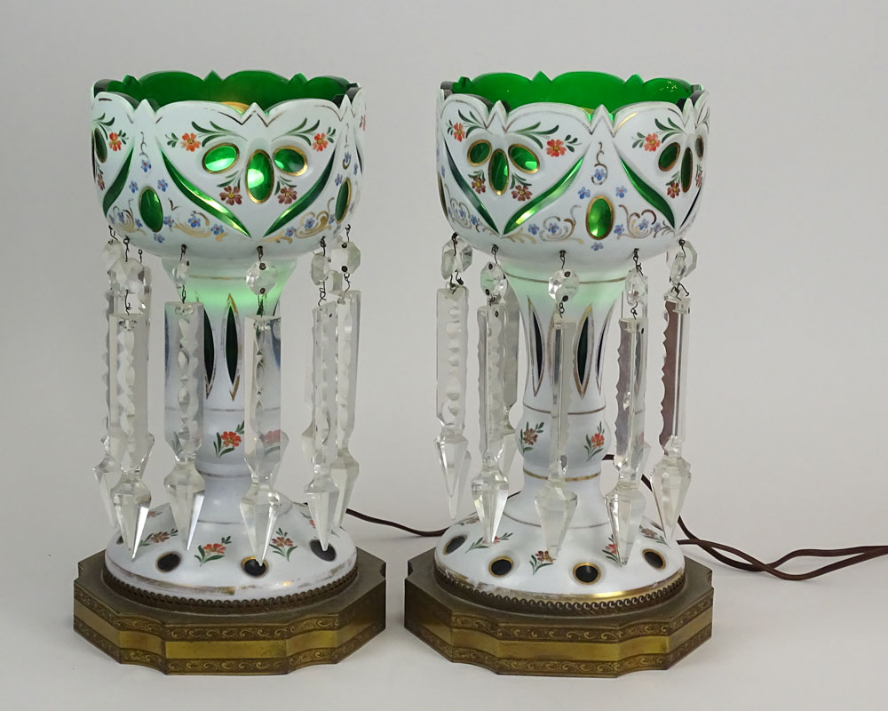 Pair of 20th Century Bohemian Glass Lusters. Electrified and with bronze bases.