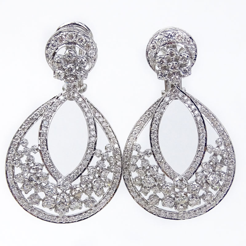 Van Cleef & Arpels style Approx. 7.24 Carat Round Brilliant Cut Diamond and 18 Karat White Gold Chandelier earrings.