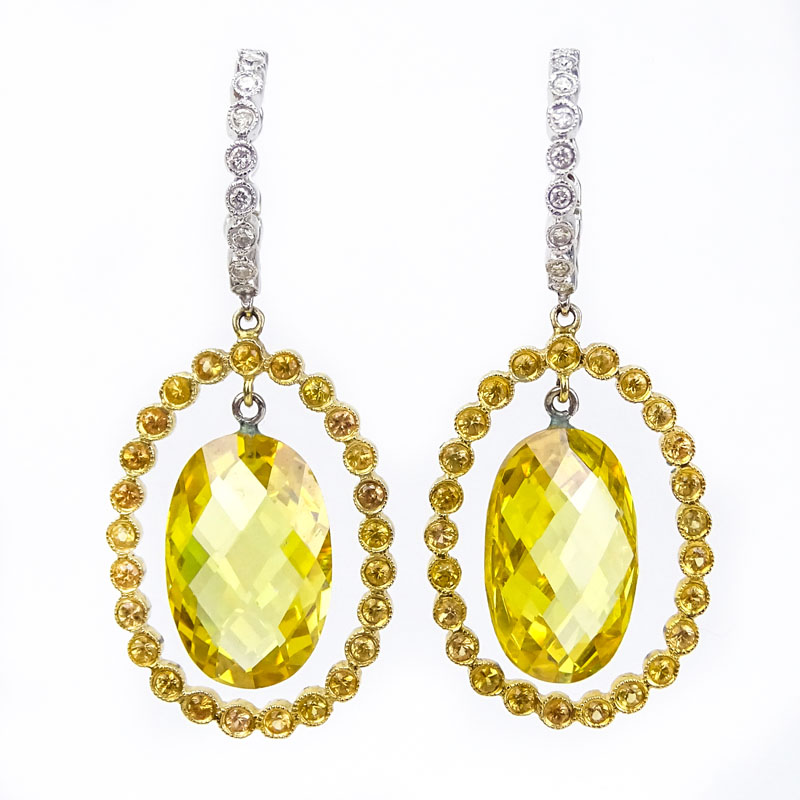 Approx. 28.69 Carat Citrine, 1.43 Carat Yellow Sapphire, .43 Carat Diamond and 14 Karat Yellow and White Gold Pendant Earrings. 