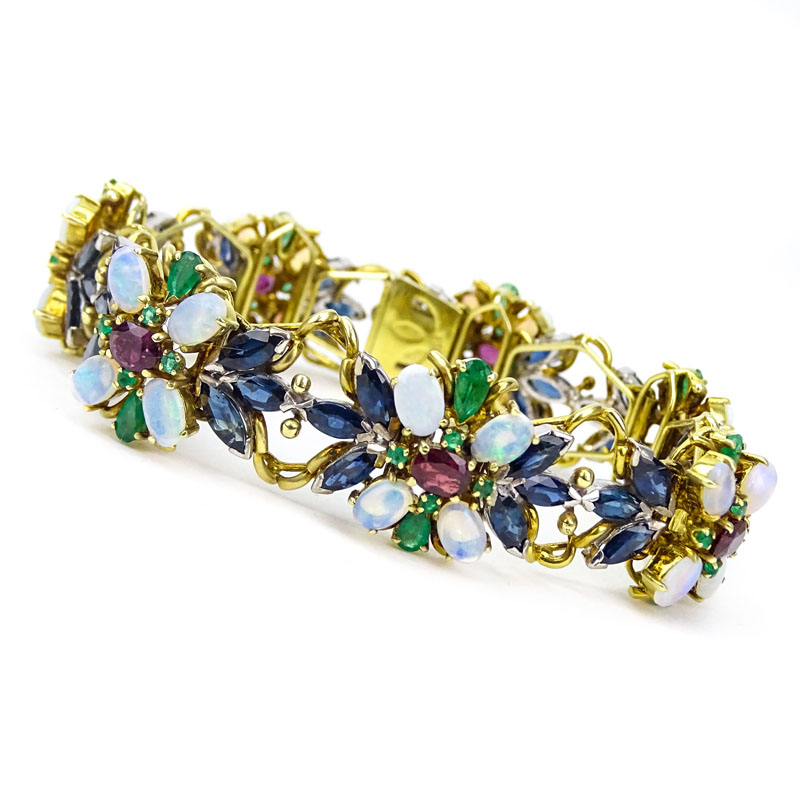Vintage Approx. 25.0 Carat Oval Cut Sapphire, Emerald, Ruby, Opal and 18 Karat Yellow Gold Bracelet. 