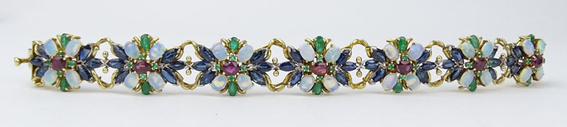 Vintage Approx. 25.0 Carat Oval Cut Sapphire, Emerald, Ruby, Opal and 18 Karat Yellow Gold Bracelet. 