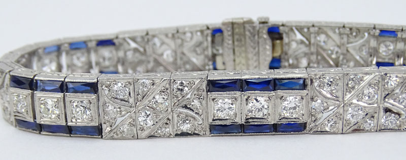 Art Deco Approx. 5.0 Carat Transition and Old European Cut Diamond, 6.50 Carat Calibre Cut Sapphire and Platinum Bracelet. 