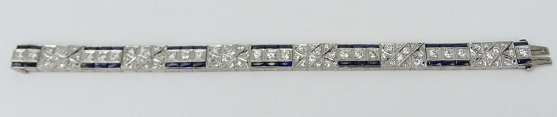 Art Deco Approx. 5.0 Carat Transition and Old European Cut Diamond, 6.50 Carat Calibre Cut Sapphire and Platinum Bracelet. 