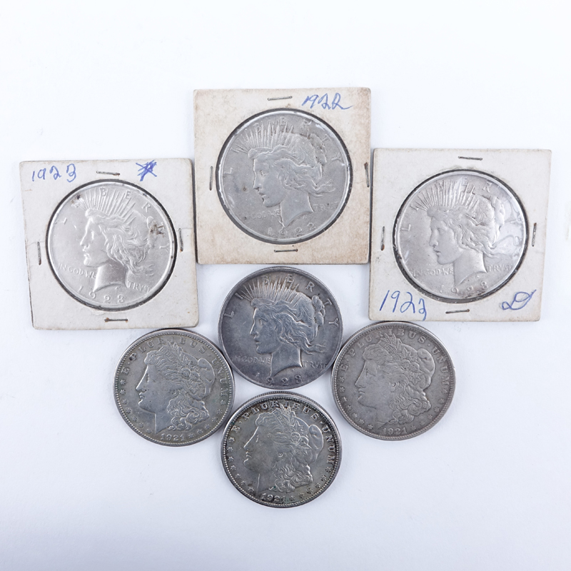 Collection of Seven (7) U.S. Silver Dollars.