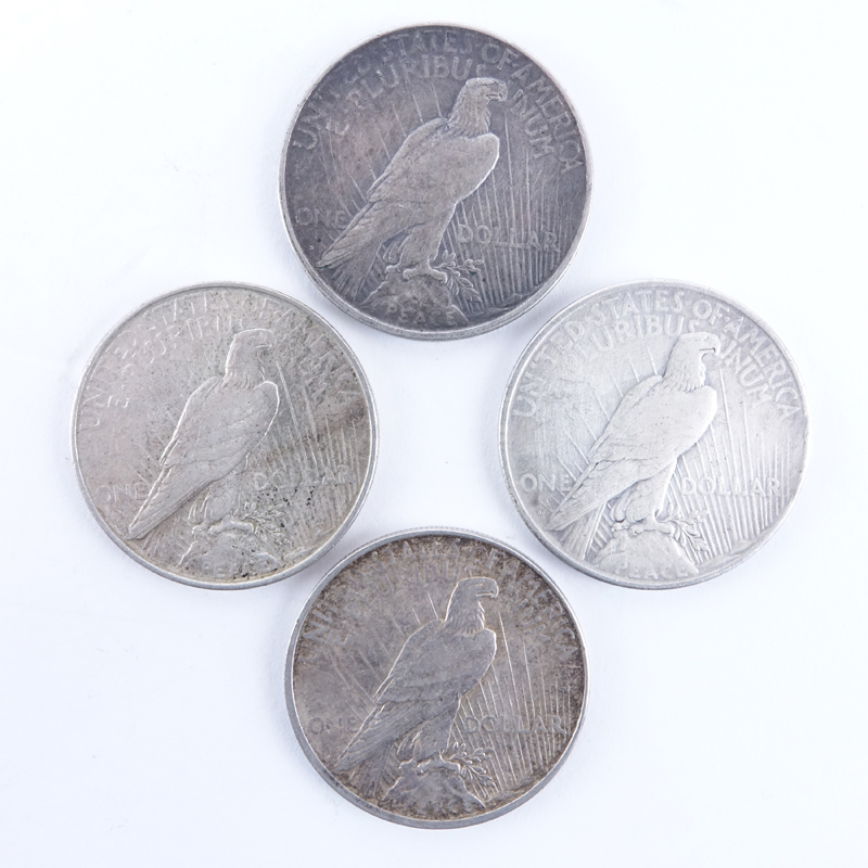 Collection of Four (4) U.S. Peace Dollars.