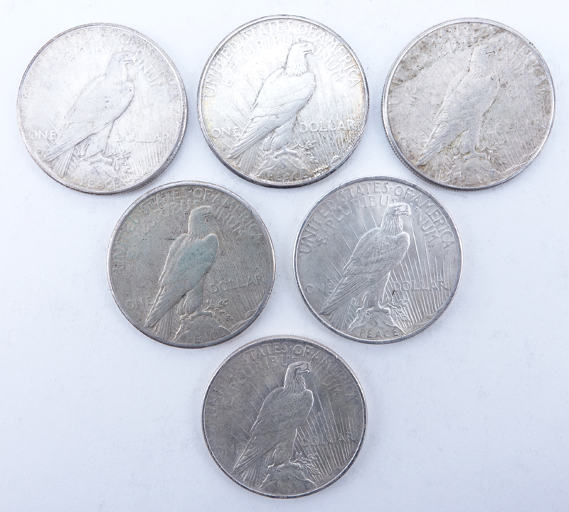 Collection of Six (6) U.S. Peace Silver Dollars.