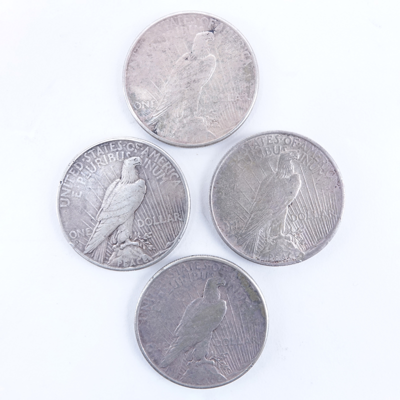 Collection of Four (4) U.S. Peace Dollars.