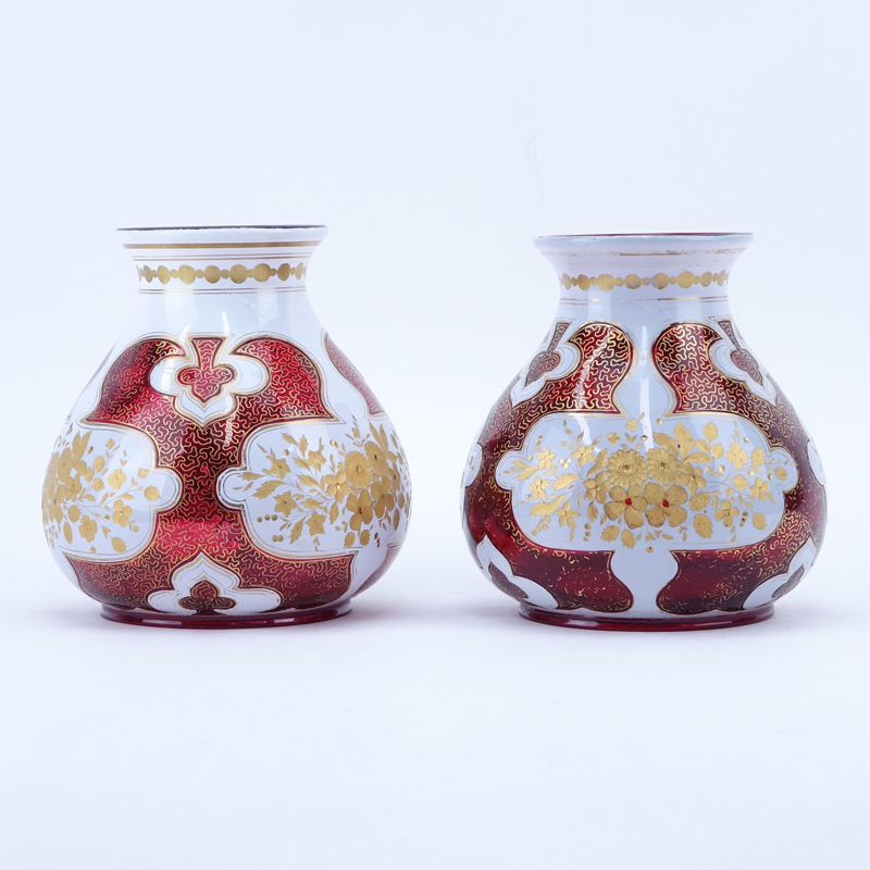 Pair of Antique Bohemian Cased Ruby and White Glass Vases with Gilt Painted Accents.