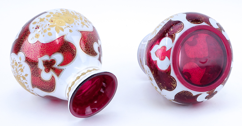 Pair of Antique Bohemian Cased Ruby and White Glass Vases with Gilt Painted Accents.