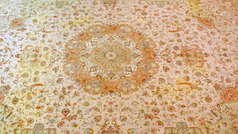 Palace Size Floral Silk & Wool Oriental Rug. Multi color floral motif with ornamental center medallion.