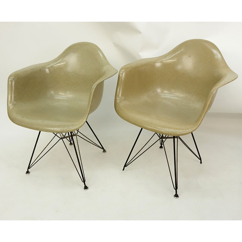 Pair of Eames for Herman Miller Molded Fiberglass Arm Chairs on Eiffel Tower Bases.