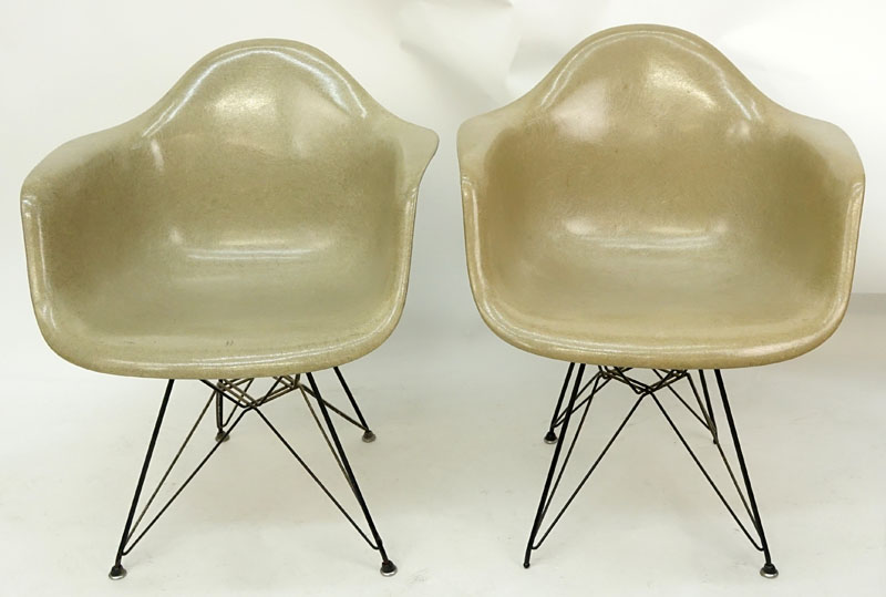 Pair of Eames for Herman Miller Molded Fiberglass Arm Chairs on Eiffel Tower Bases.