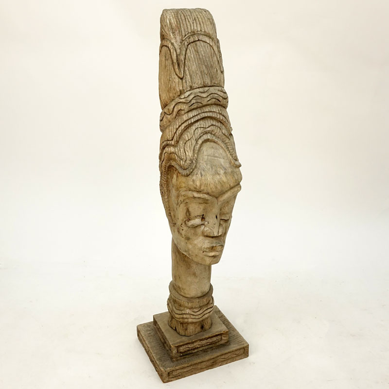 Large African Carved Wood Bust Of A Woman.