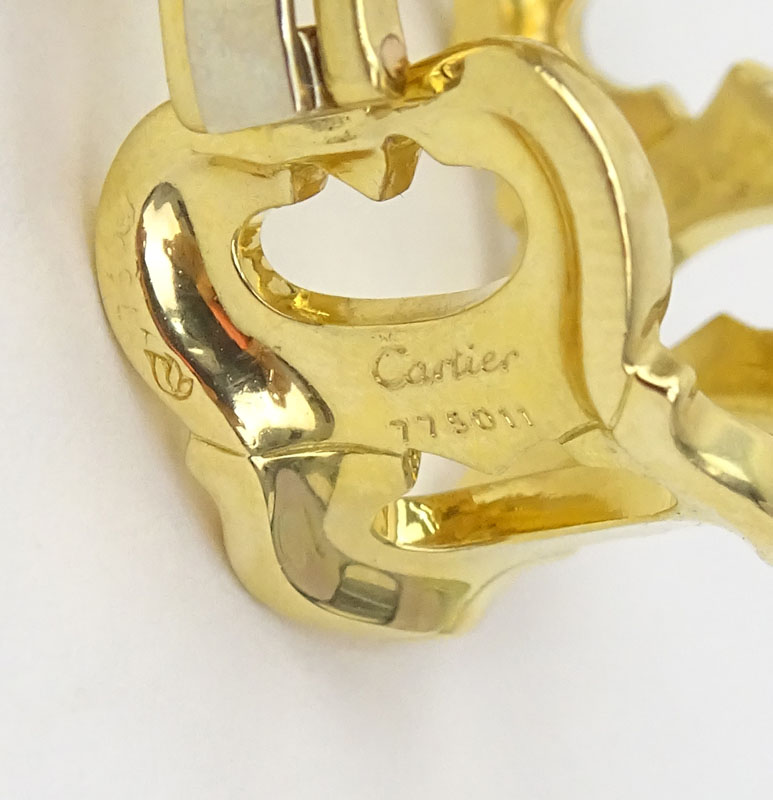 Cartier C de Cartier 18 Karat Yellow Gold Oval Semi Hoop Earrings Omega Back.