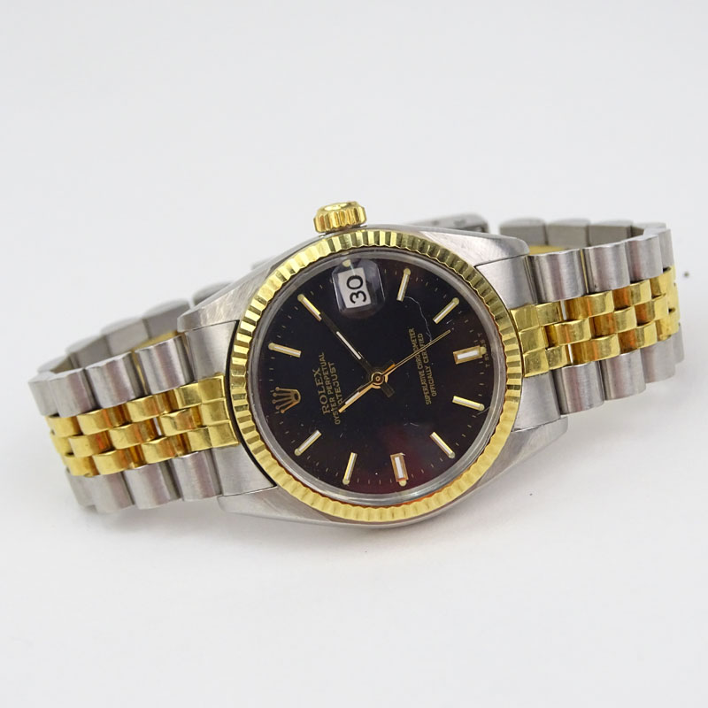 Vintage Rolex Datejust 18K Yellow Gold and Stainless Steel Jubilee Black Dial Watch, 31mm Case. Good vintage condition.