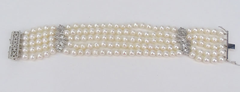 Approx. 1.35 Carat Diamond. Pearl and 18 Karat White Gold Five Strand Bracelet.