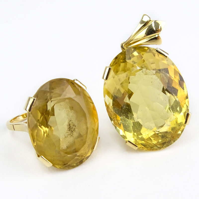 Large Oval Cut Yellow Citrine and 18 Karat Yellow Gold Ring and Pendant Suite.