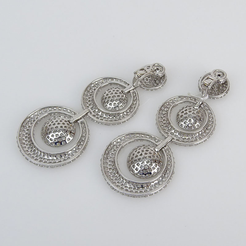 Contemporary Approx. 12.20 Carat Pave Set Round Brilliant Cut Diamond and 18 Karat White Gold Pendant Earrings.