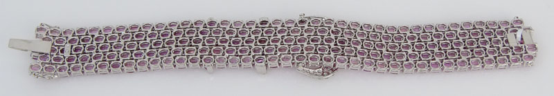 Contemporary Approx. 63.46 Carat Oval Cut Pink Sapphire, 2.16 Carat Round Brilliant Cut Diamond and 18 Karat White Gold Bracelet. 