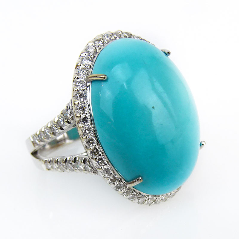 Contemporary Oval Cabochon Turquoise, 1.05 Carat Round Brilliant Cut Diamond and 18 Karat White Gold Ring. 