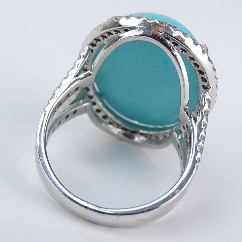 Contemporary Oval Cabochon Turquoise, 1.05 Carat Round Brilliant Cut Diamond and 18 Karat White Gold Ring. 