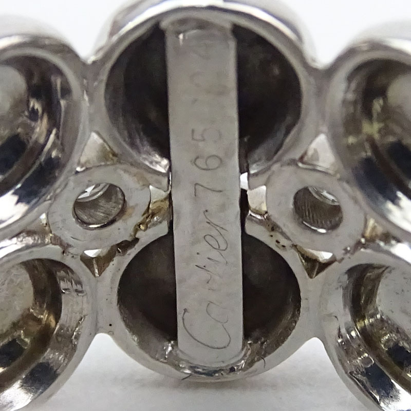 Cartier 18 Karat White Gold and Diamond Circular Band Ring.