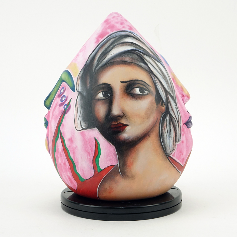 Alexander Flores, Mexican (20th C) Ceramic sculpture with polychrome figural motif.