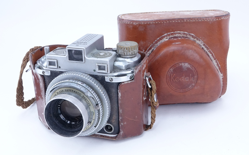 Grouping of Kodak Medalist II and Kodak Signet 35 Film Cameras in Leather Cover.
