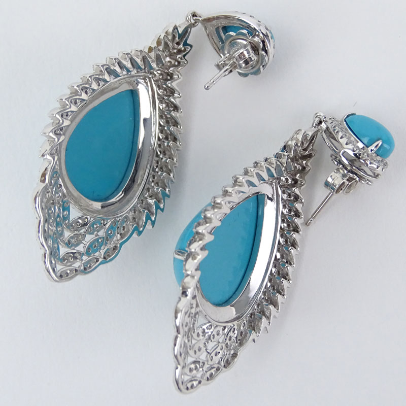 Approx. 17.15 Carat Persian Turquoise, 1.81 Carat Diamond and 14 Karat White Gold Pendant Earrings. 
