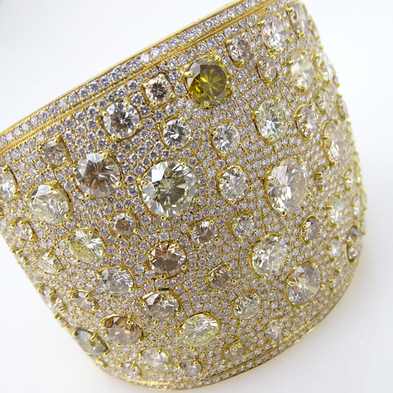 Exceptional Approx. 41.24 Carat Natural Untreated Multi Fancy Color Diamond, 17.11 Carat Micro Pave Set White Diamond and 18 Karat Yellow Gold Wide Cuff Bangle Bracelet. 