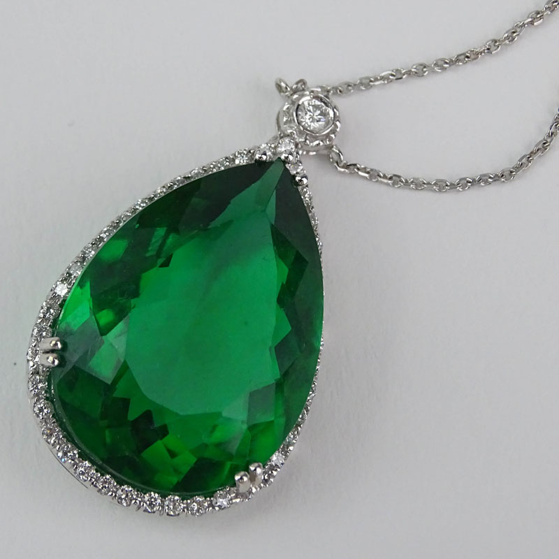 Approx. 23.93 Carat Pear Shape Green Stone, .65 Carat Diamond and 14 Karat White Gold Pendant Necklace. 