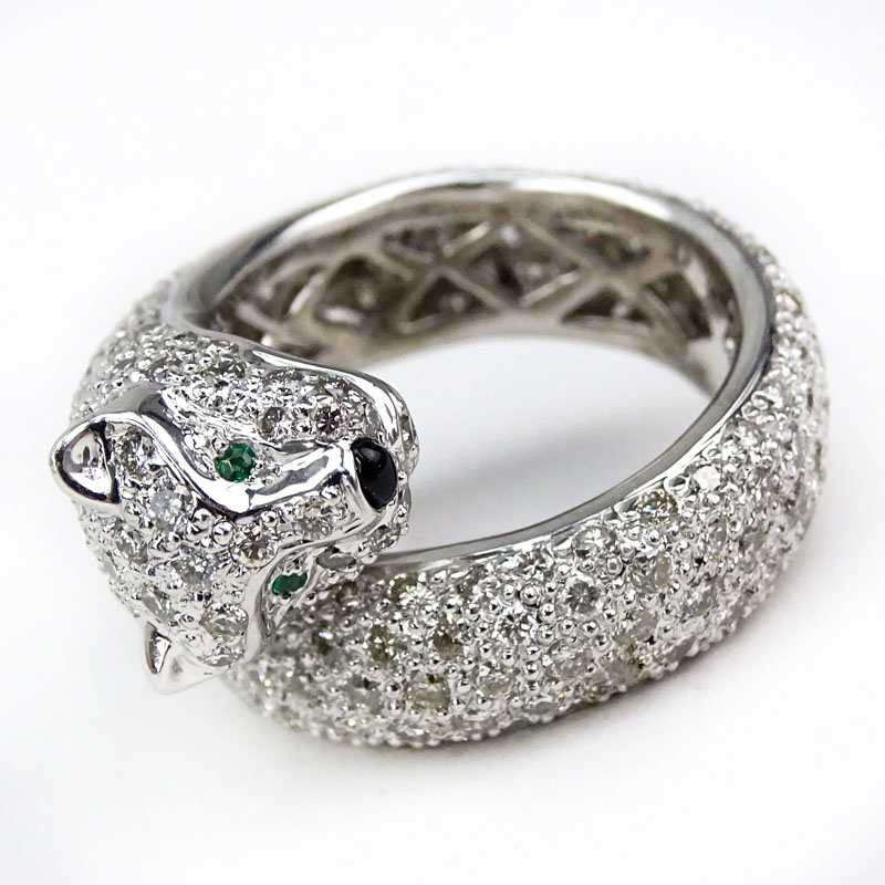 Cartier style Approx. 3.65 Carat Pave Set Round Brilliant Cut Diamond and 18 Karat White Gold Panther Ring with Emerald Eyes.