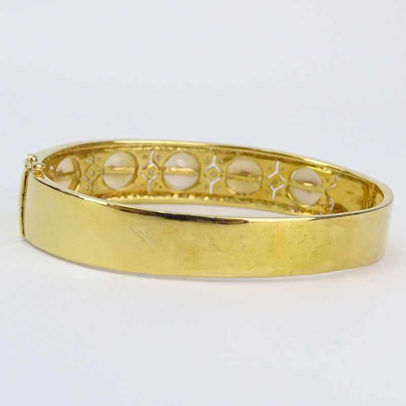 Vintage Hong Kong Pave Set Diamond, Five Pearl and 14 Karat Yellow Gold Hinged Cuff Bangle Bracelet. 