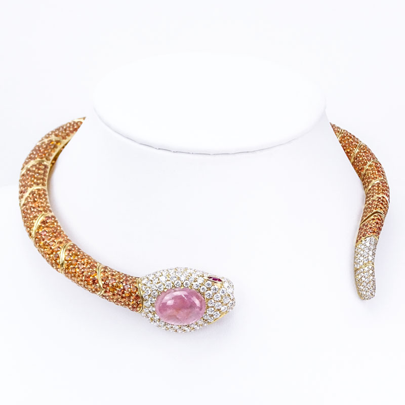 Finely Made Contemporary Approx. 8.60 Carat Pave Set Round Brilliant Cut Diamond, 20.0 Carat Cabochon Pink Sapphire, 80.10 Carat Pave Set Orange Sapphire and 18 Karat Yellow Gold Articulated Snake Hinged Choker Necklace. 