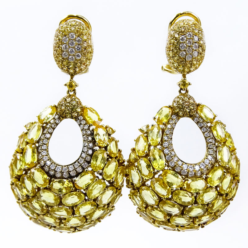 Approx. 30.0 Carat Yellow Sapphire, 1.0 Carat Diamond and 18 Karat Yellow Gold Pendant Earrings. 