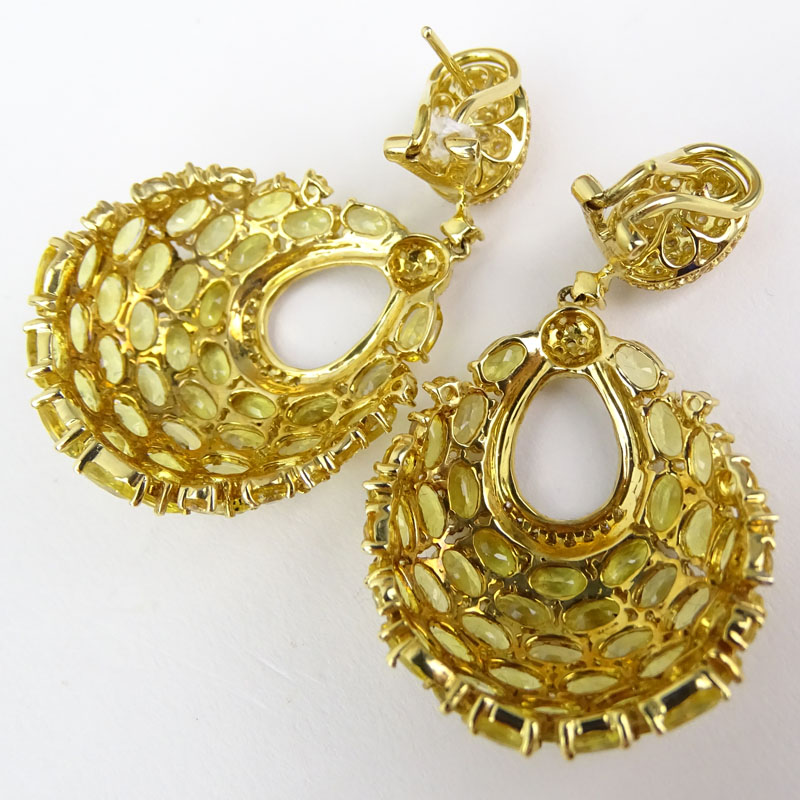 Approx. 30.0 Carat Yellow Sapphire, 1.0 Carat Diamond and 18 Karat Yellow Gold Pendant Earrings. 