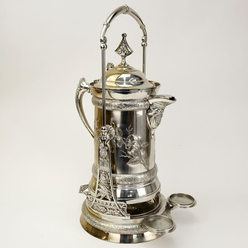 Antique Southington Co. Silver Plated Tilting Water Pitcher.