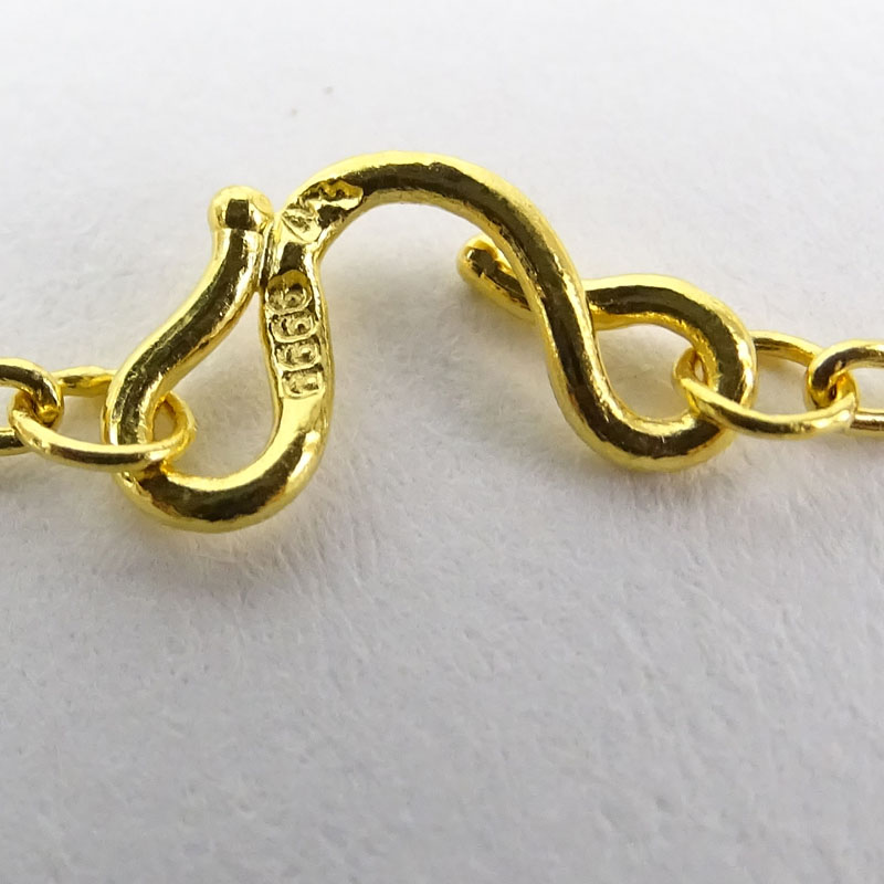 Vintage 24 Karat Yellow Fine Gold Lion Pendant Necklace Accented with Fancy Yellow Diamonds.