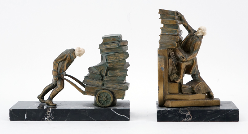 Pair of Gilt Metal Figural Bookends with Celluloid Faces.