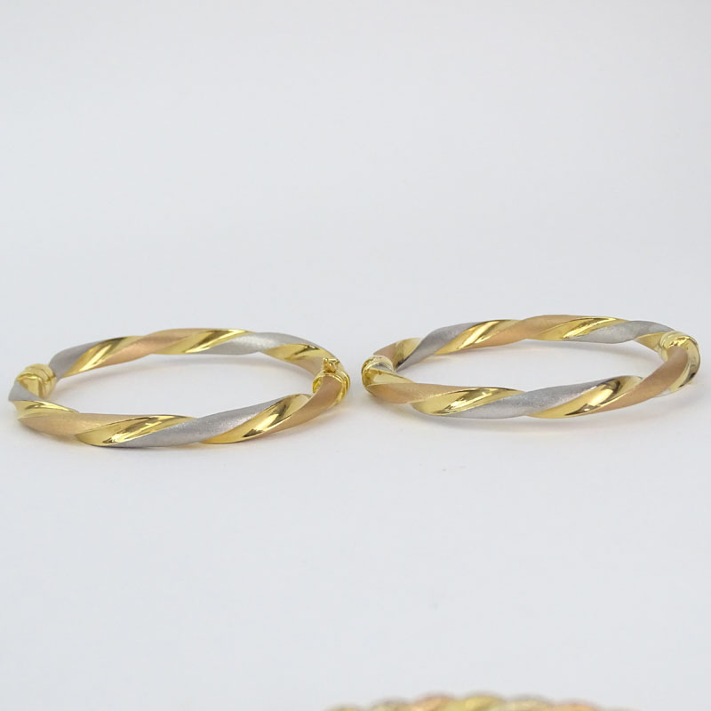 Collection of Five Vintage Italian Tri-Color Gold Bangles Including Three (3) 18 Karat and Two (2) 14 Karat.